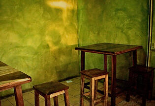 Site Design Progression: Bangkok Jungle was to cover the expat music scene in Bangkok, Thailand, and we needed a header that caught people's attention. This green cafe scene was shot by photographer Bob Lorimor for that purpose. The shot, however, failed t